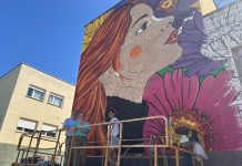 La fachada del Centro Social de Villa Román se transforma en un mural por la igualdad
